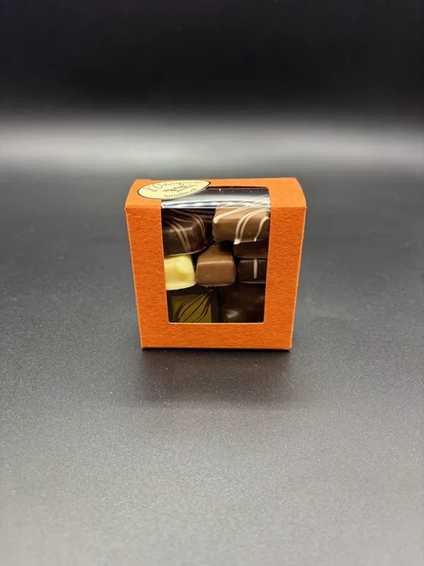 Chocolats en vrac, boîte orange avec fenêtre